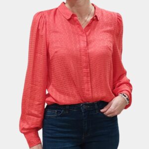 Chemise unie manches bouffantes.